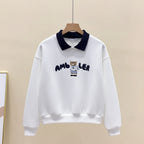 White cute embroidered long sleeve preppy top with black collar and bear embroidery on front