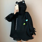 Black cute frog pullover sweatshirt with hood featuring frog eyes and claws from Vusy Kawai Shop