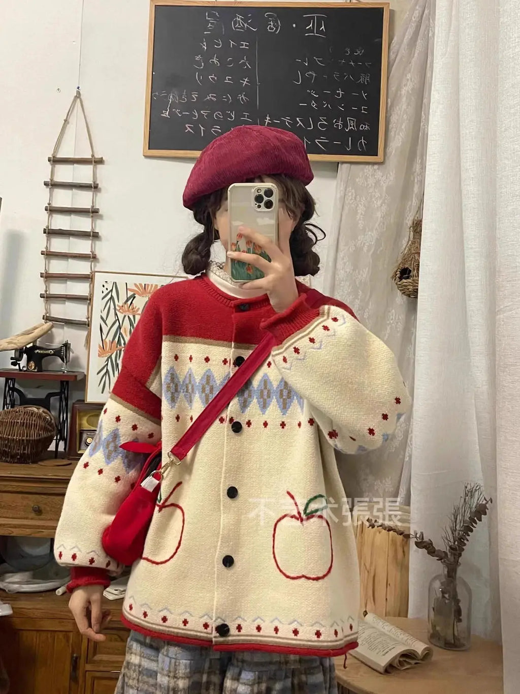 Cute retro apple knitted cardigan in cream and red with apple patterns and diamond shapes