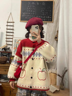 Cute retro apple knitted cardigan in cream and red with apple patterns and diamond shapes