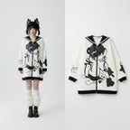 Cute thick long sleeve Japanese hoodie in white with black accents and graphic design worn with fishnet stockings