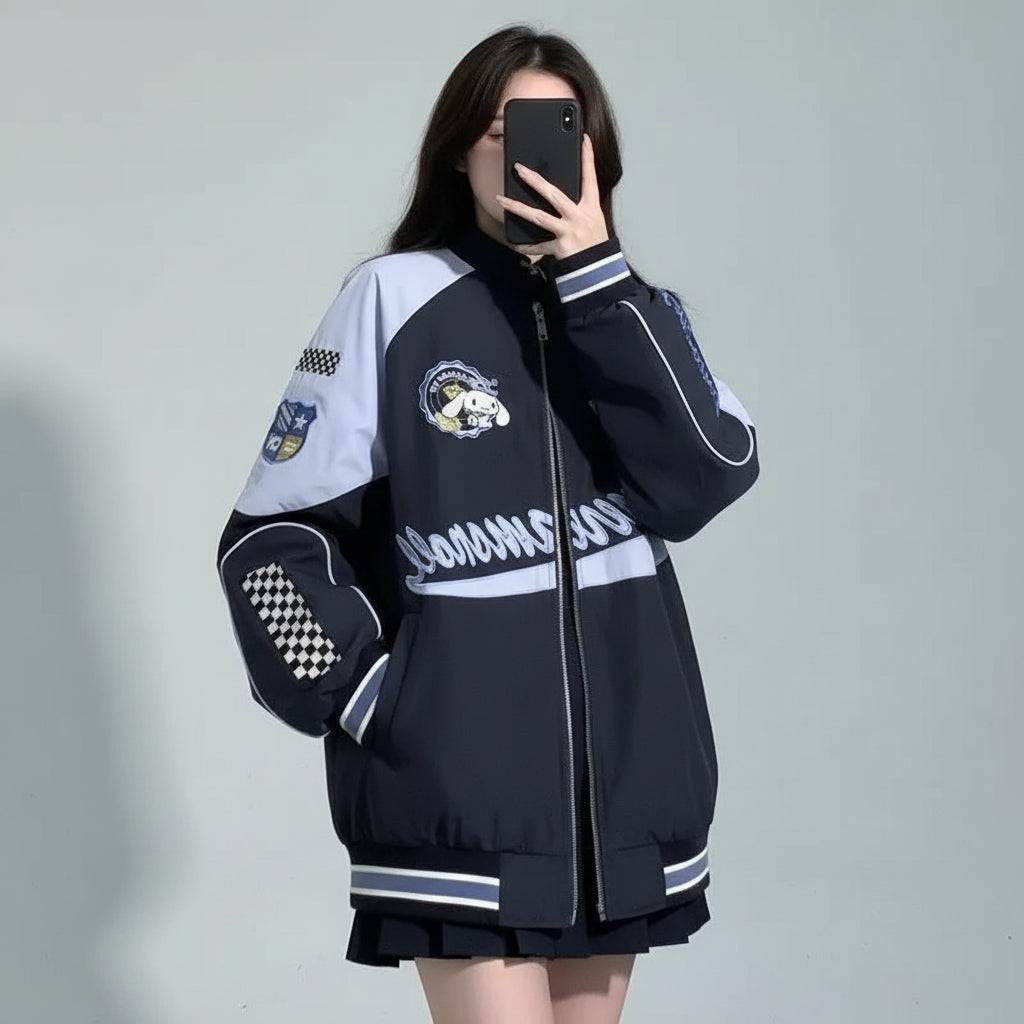 Embroidered baseball cap style jacket in black and white with patches and checkered detail