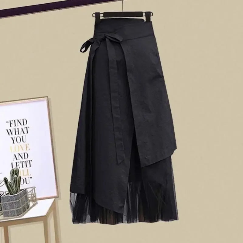 Black fashionable slimming skirt set for women with layered design and waist tie belt