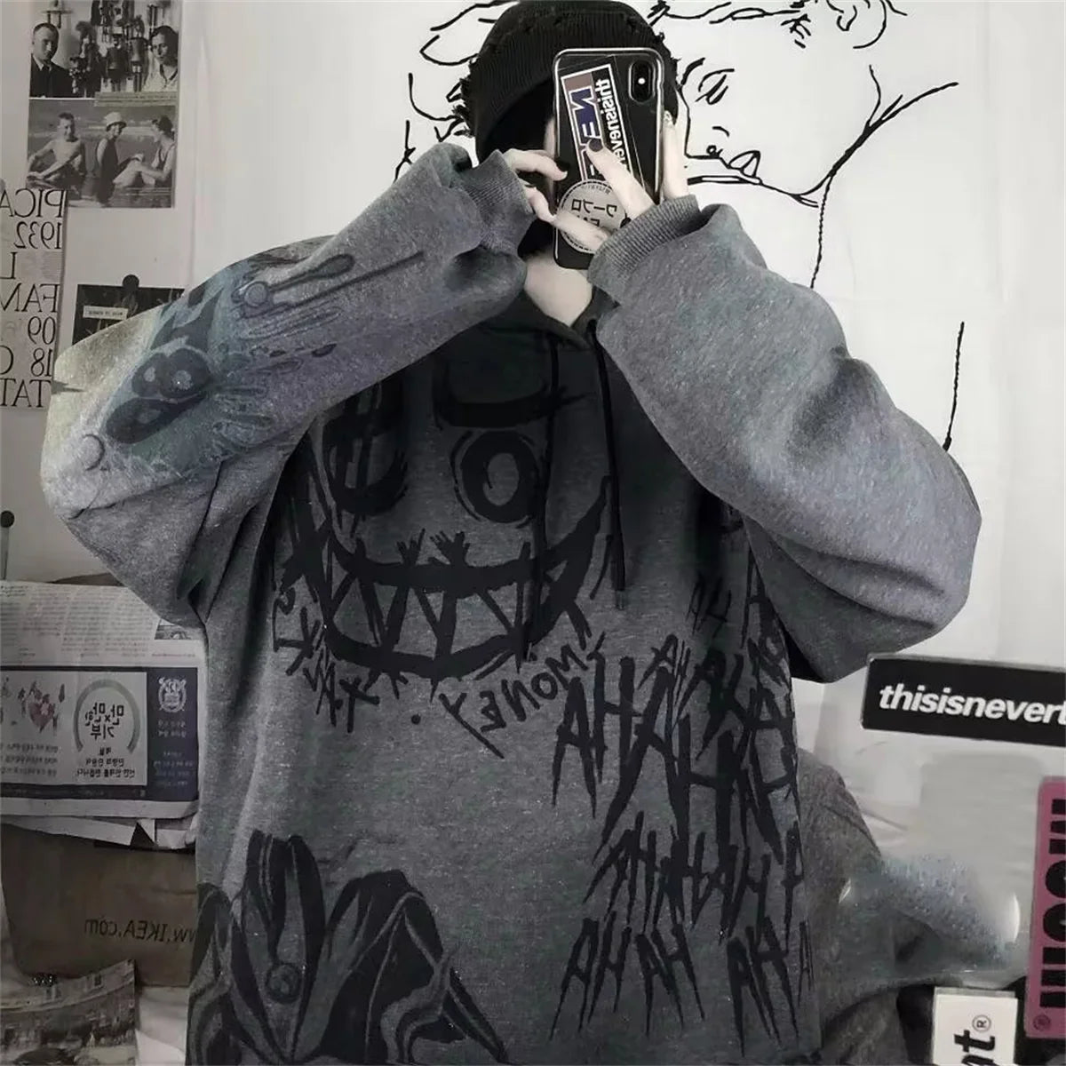 Funny punk japanese cartoon hoodie girl wearing gray oversized hoodie with black graffiti style art