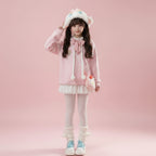 Harajuku cute pink embroidered jacket worn with white skirt and accessories for a playful look
