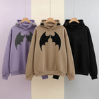 Three harajuku gothic hoodie for women in purple black and beige with bat wings and horn details on hoods