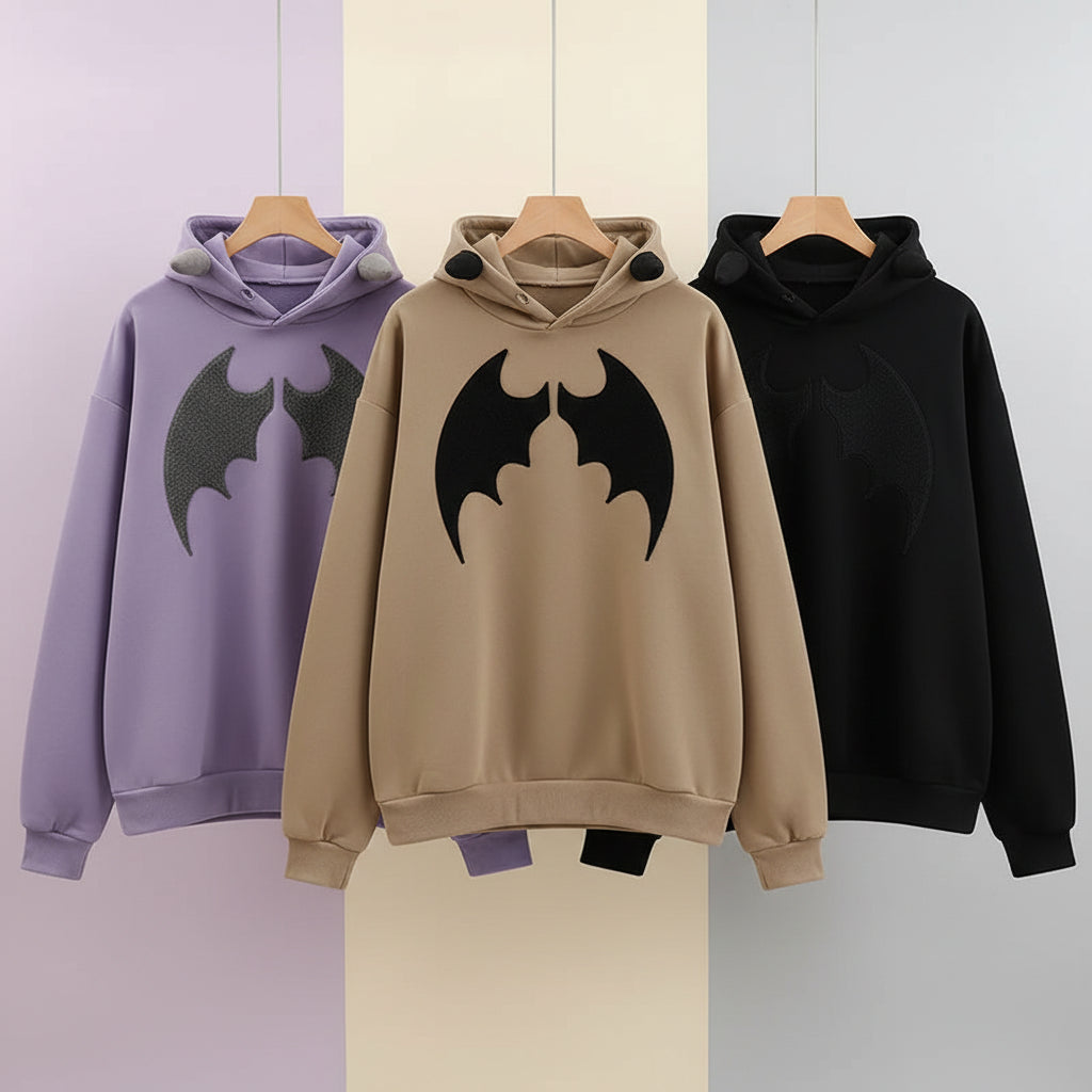Three harajuku gothic hoodie for women in purple black and beige with bat wings and horn details on hoods