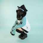Person wearing black and teal harajuku shark grunge zip up sweatshirt with hood and face mask outdoor