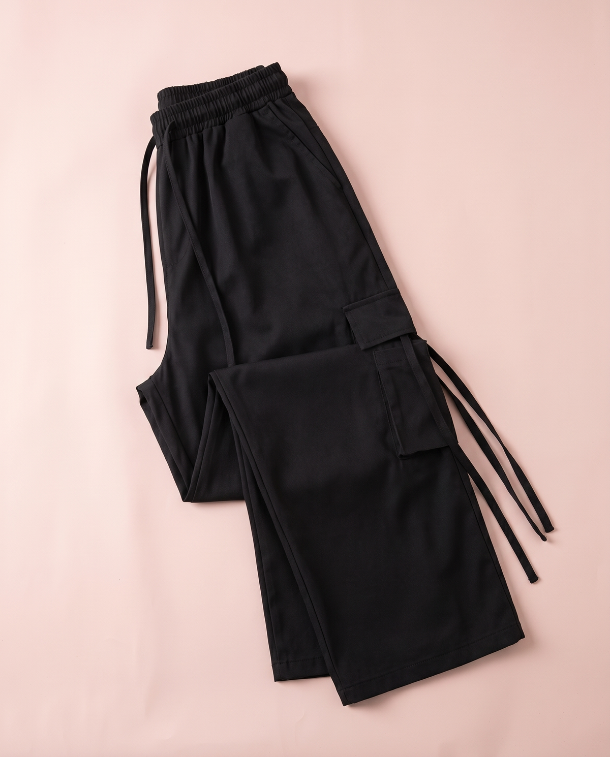 Black wide-leg cargo pants with flap pockets