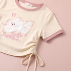 Close-up of the puppy print, pink ringer collar and side drawstring detail