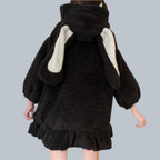 Black fluffy japanese cute rabbit ear hoodie for women with white inner ears and ruffled hem