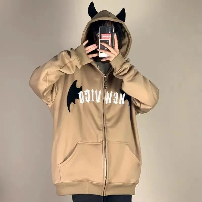Japanese devil anime hoodie for couples in tan with black horns and bat wings design on front