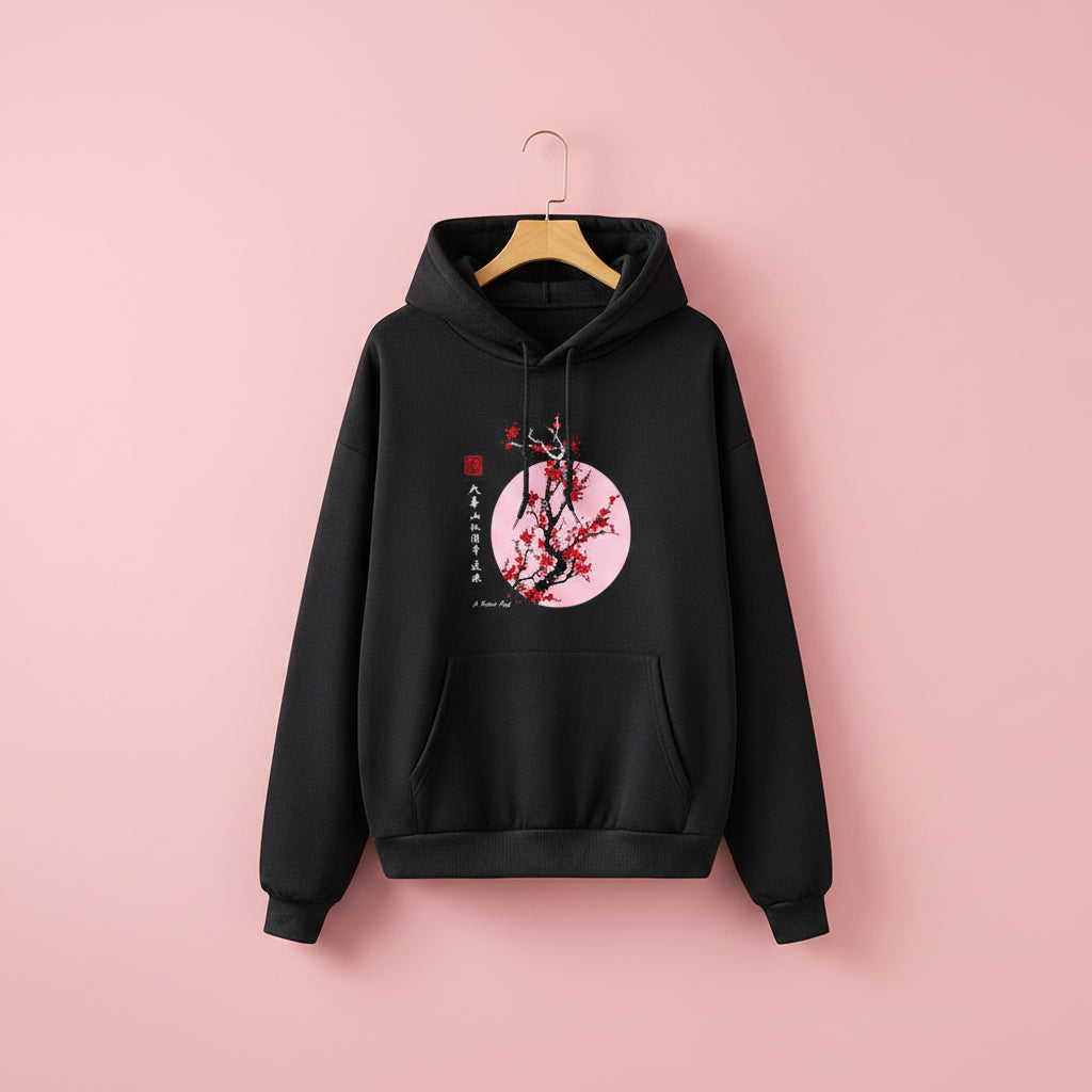 Black hoodie with Japanese flower graphic sweatshirt design featuring red cherry blossoms and pink circle background
