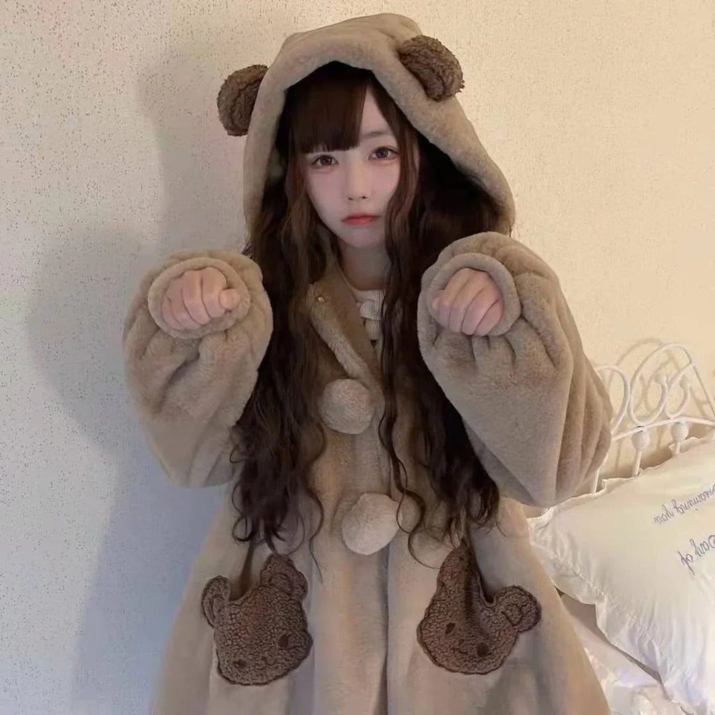 Japanese style lamb wool coat in beige with bear ears hood and bear face pockets worn by young woman