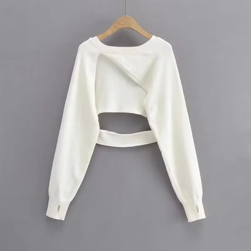 White long sleeve crop top part of women's floral sling dress set from Vusy Kawai Shop on wooden hanger