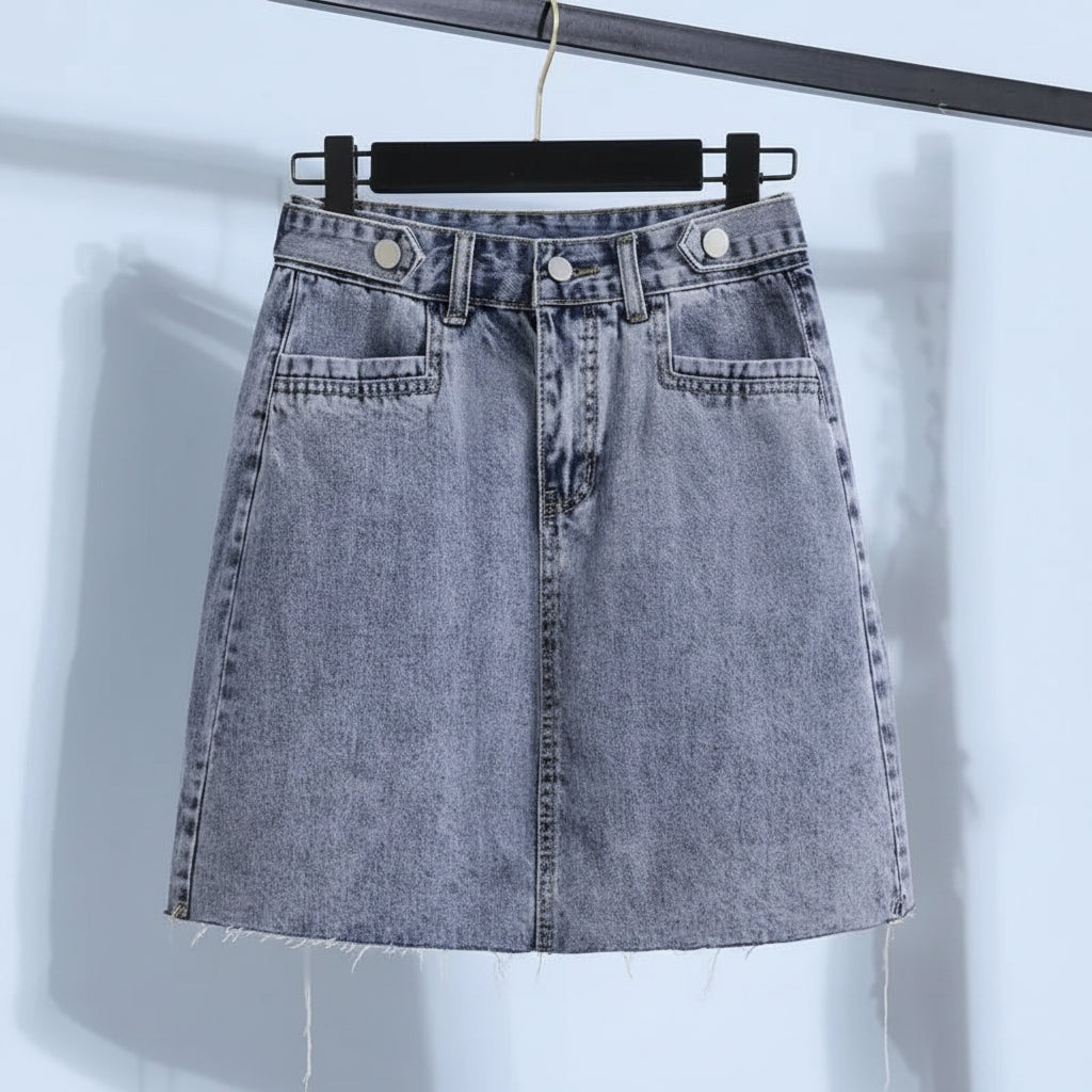 Blue denim skirt hanging on black hanger from Vusy Kawai Shop for women stripe t shirt denim skirt set