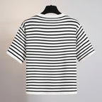 Back view of a women stripe t shirt denim skirt set top with black and white horizontal stripes