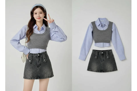 Young woman wearing a Korean striped shirt and sweater set with a black denim skirt and black shoes indoors