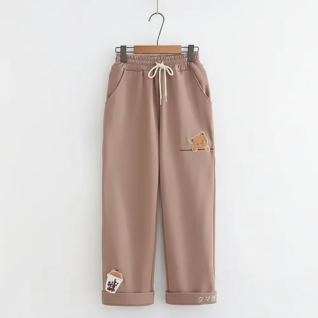 Cute beige pants with teddy bear patches from Vusy Kawai Shop, perfect complement for kawaii bear japanese hoodie for women