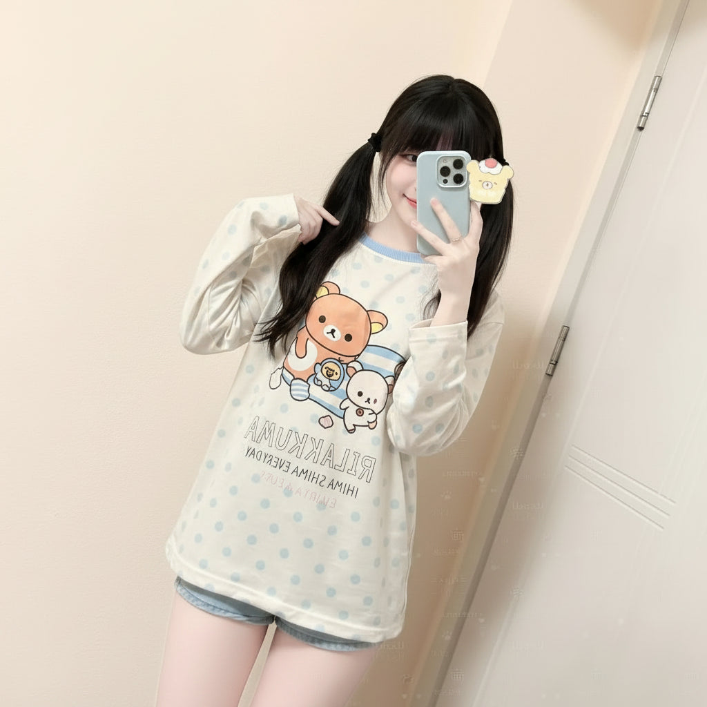 Kawaii cartoon long sleeve t shirt with bear and bunny design worn by girl taking mirror selfie