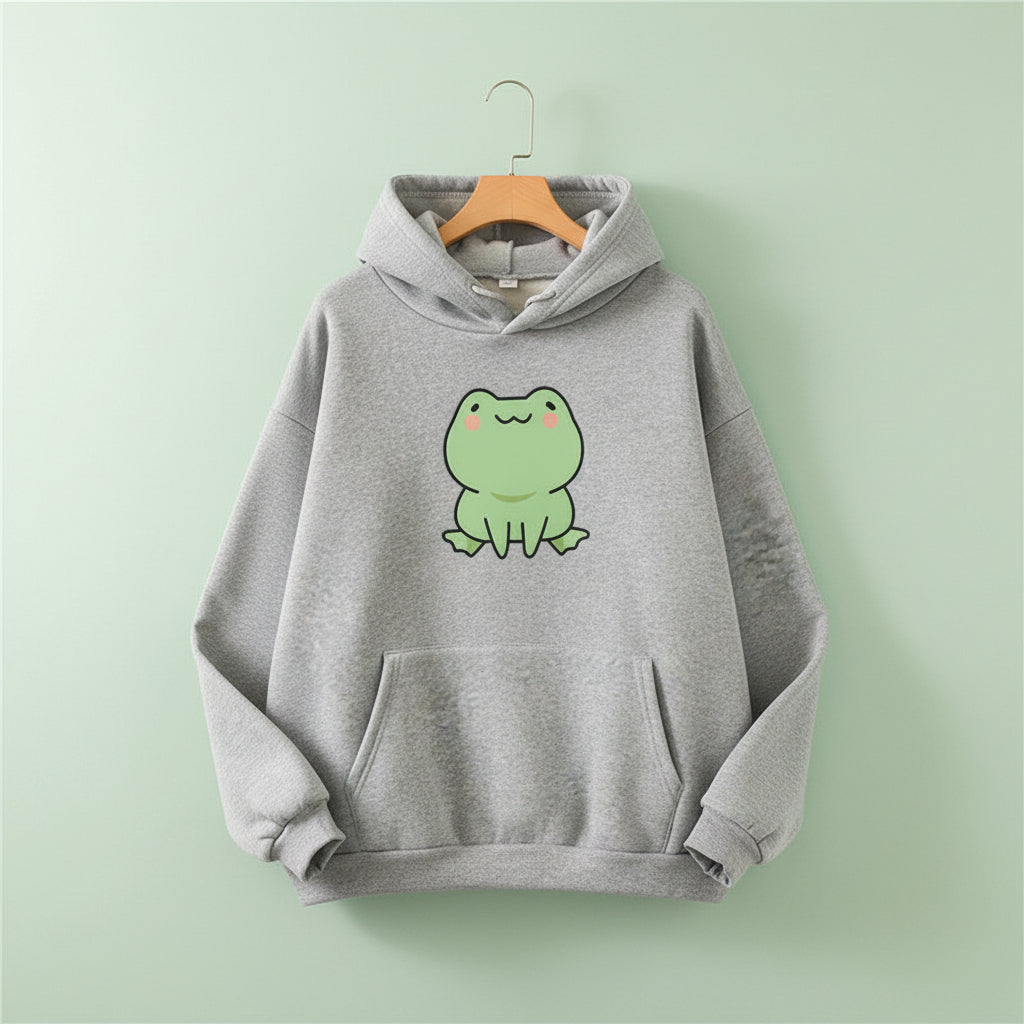 Gray kawaii Japanese frog hoodie with pockets featuring a cute green frog graphic on the front