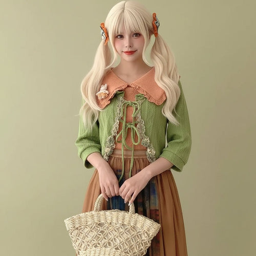 Woman wearing a green kawaii lolita cardigan for women with a large collar and bow details holding a woven basket bag
