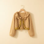Kawaii lolita cardigan for women in beige knit with ruffle collar and floral embroidery from Vusy Kawai Shop
