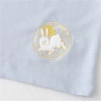 Close-up of kawaii loose long sleeve spring hoodie with embroidered white bunny and yellow sun design