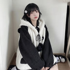 Cozy kawaii panda hooded cute jacket in black and white fuzzy fabric with panda details