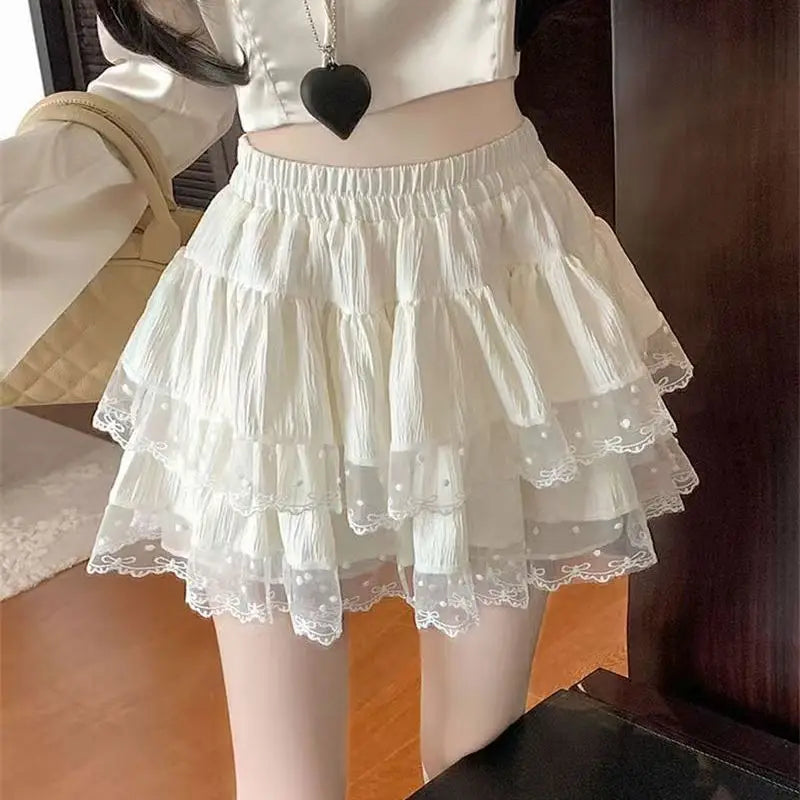 White layered ruffle skirt with lace details from kawaii pink bowknot top and skirt set by Vusy Kawai Shop