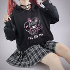 Black kawaii preppy patchwork crop hoodie with bunny graphic and text paired with black plaid skirt