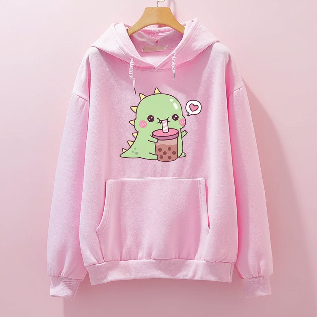 Pink kawaii unisex dinosaur hoodie with cute green dinosaur drinking bubble tea graphic