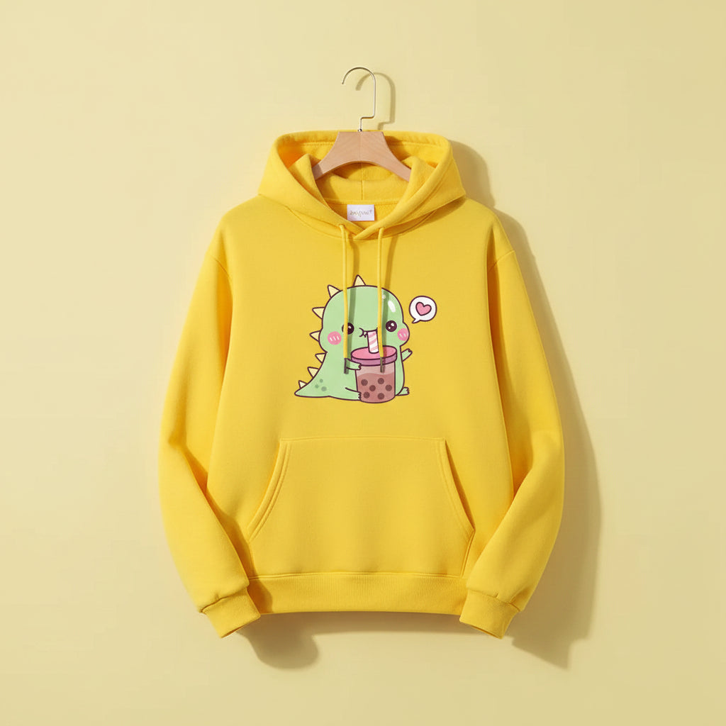 Yellow kawaii unisex dinosaur hoodie with cute green dinosaur sipping bubble tea graphic