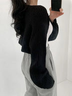 Korean knitted short cardigan in black, featuring wide sleeves and a cropped design, perfect for layering