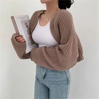 Korean knitted short cardigan in beige with stylish balloon sleeves, perfect for layering in cool weather