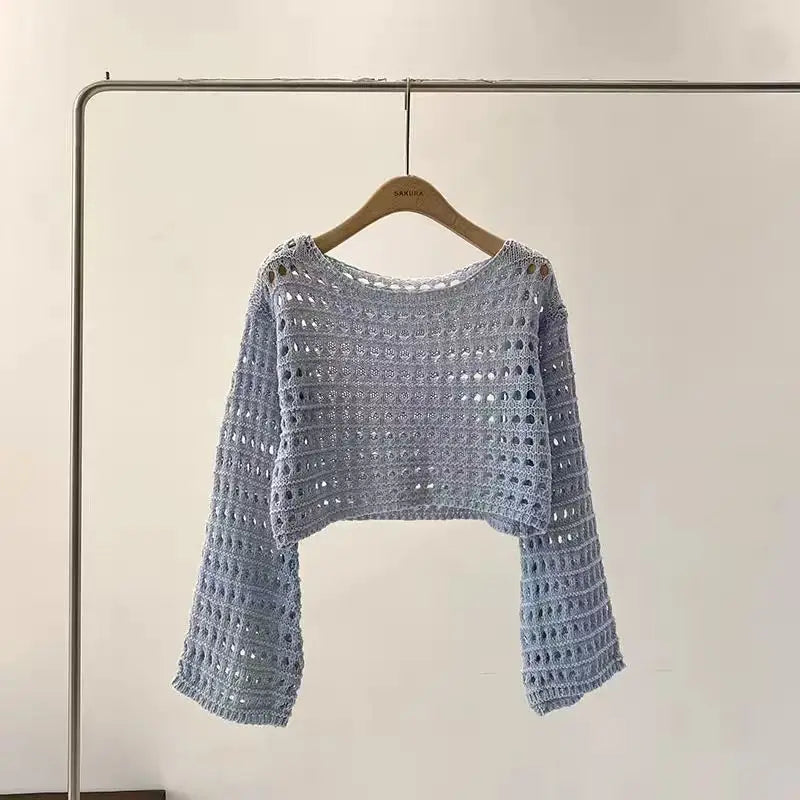 Light blue korean streetwear crochet top with long sleeves and a cropped design for summer outfits