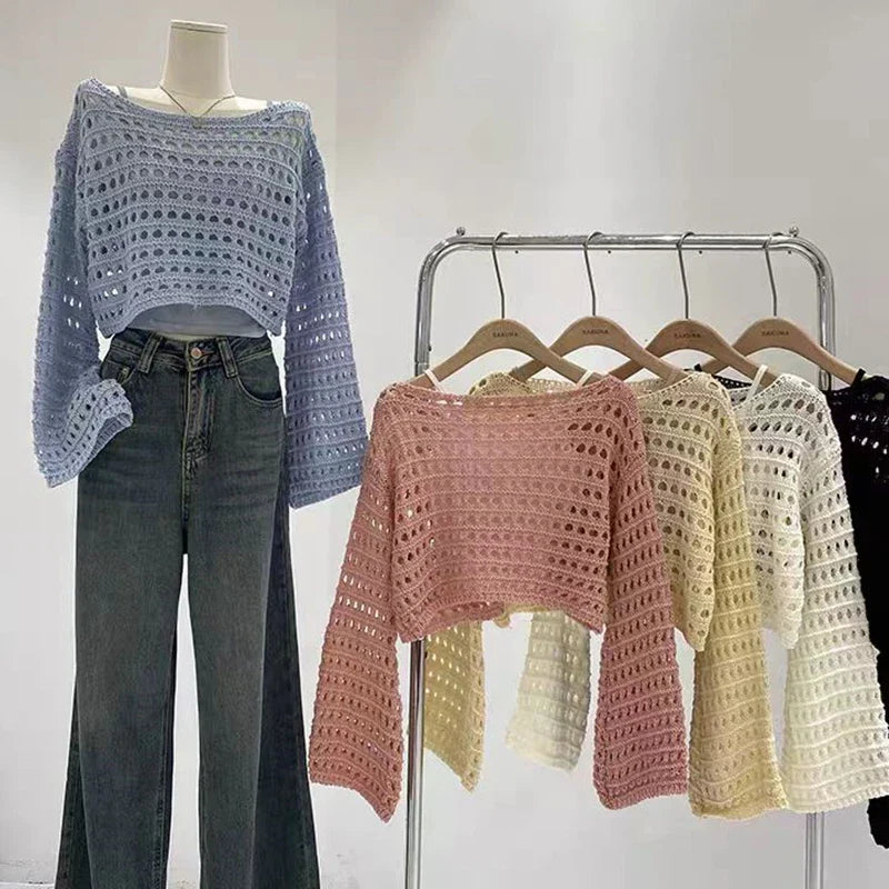 Vusy Kawai Shop Korean streetwear crochet top in blue, pink, cream, and black with a relaxed fit and open knit design