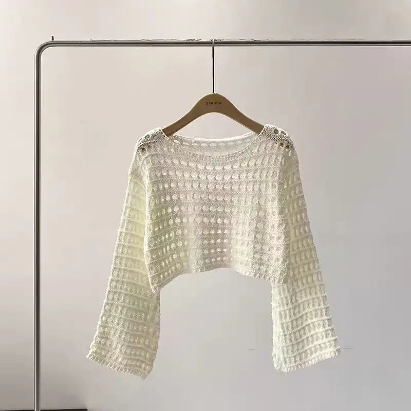 Vusy Kawai Shop Korean streetwear crochet top in white with a stylish cropped design and long sleeves