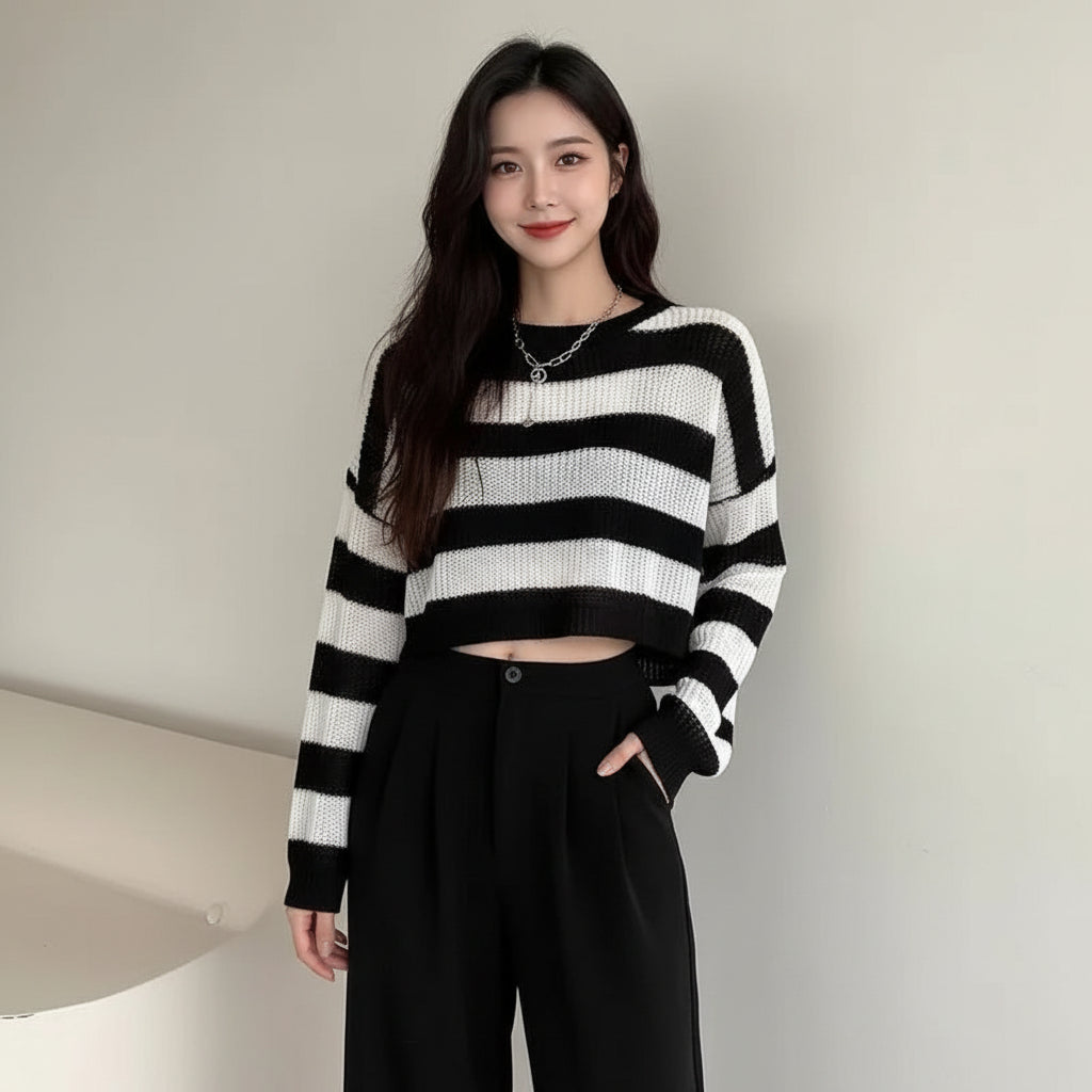 Korean striped knit sweater in black and white worn with black high-waist pants from Vusy Kawai Shop