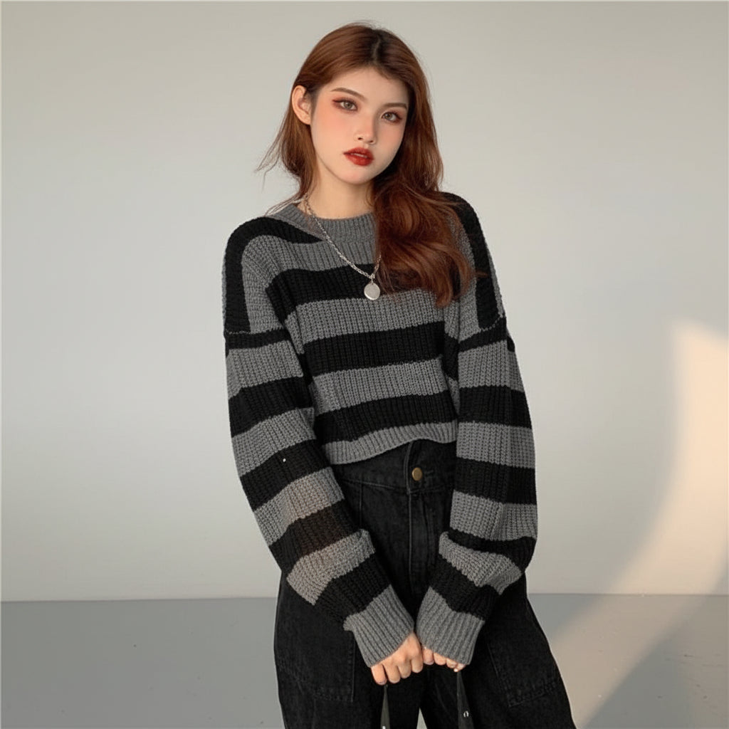 Young woman wearing Korean striped knit sweater in black and gray with long sleeves and round neckline