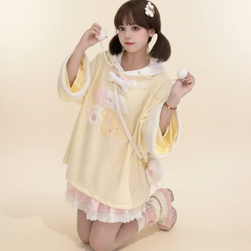 Cute young woman wearing a yellow japanese style casual drawstring hoodie with playful details and white lining