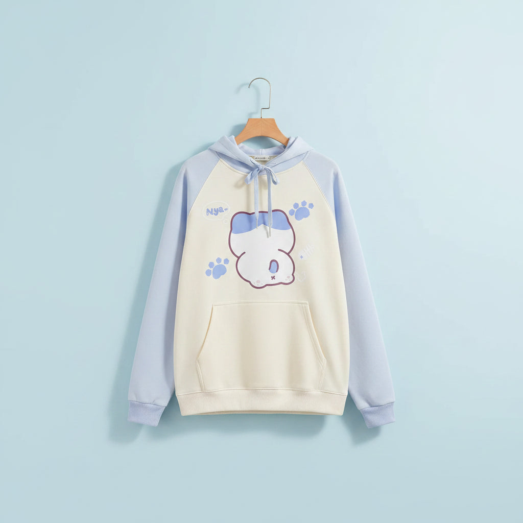 Kuromi print kawaii sweatshirt with light blue sleeves and cream body featuring cute paw prints and character design