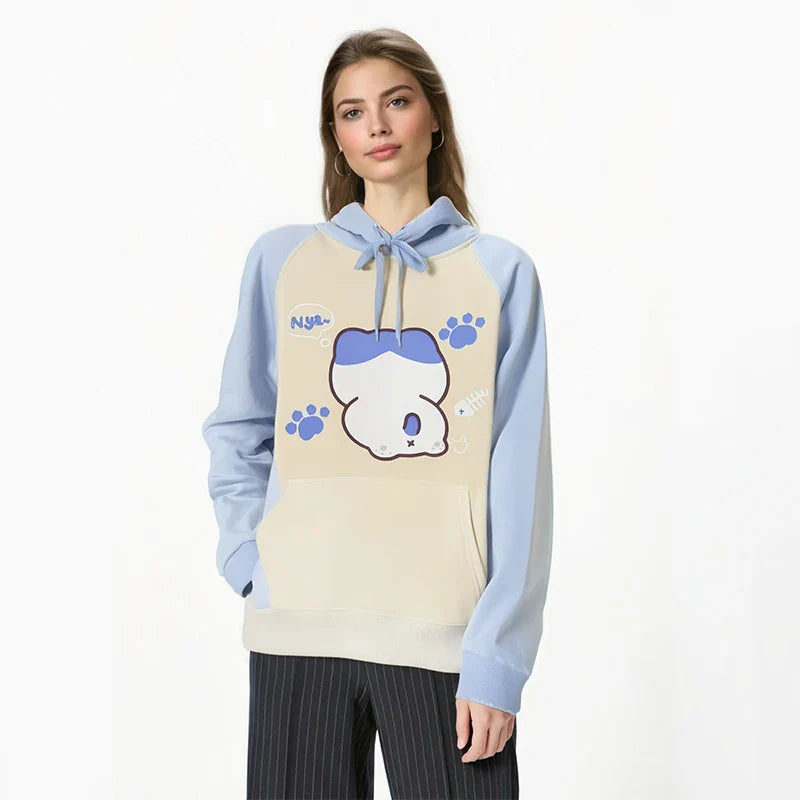 Kuromi print kawaii sweatshirt with blue and cream color block and paw print design by Vusy Kawai Shop
