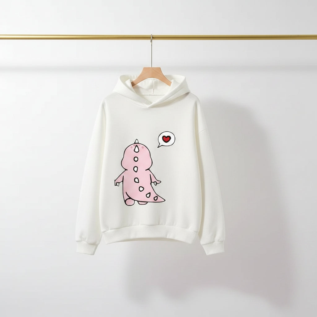 White matching couple hoodies with cartoon design featuring a cute pink dinosaur with heart speech bubble
