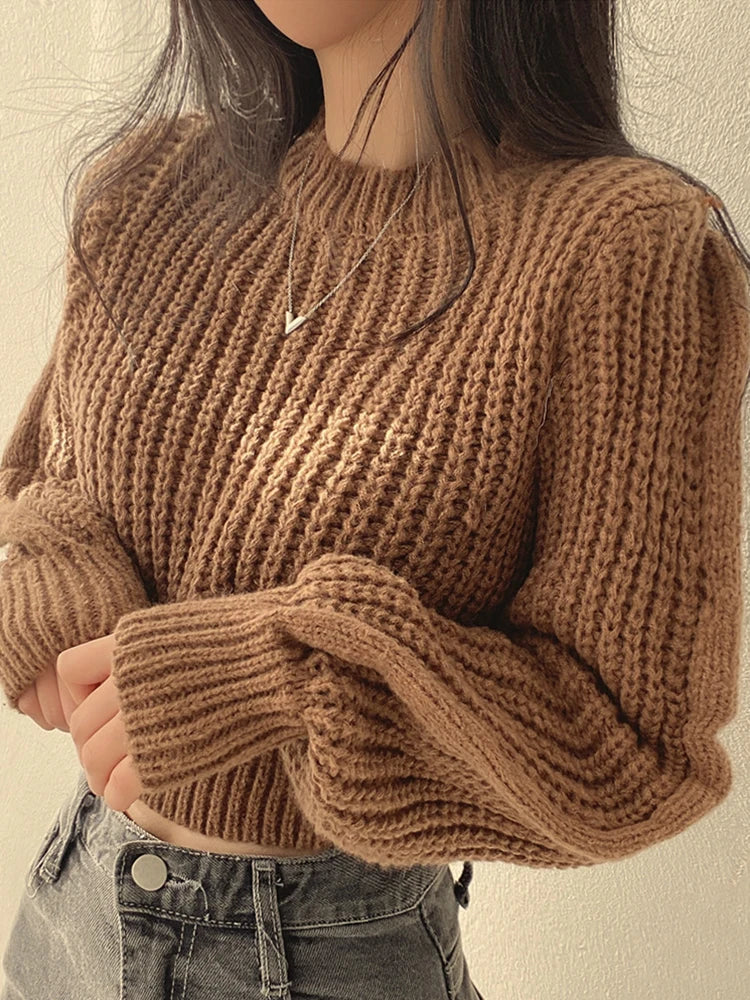 Loose vintage Korean knit sweater in brown, featuring a ribbed texture and cozy fit