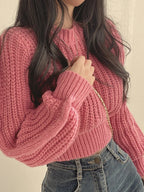 Loose vintage Korean knit sweater in pink, featuring a cozy cropped design and soft texture