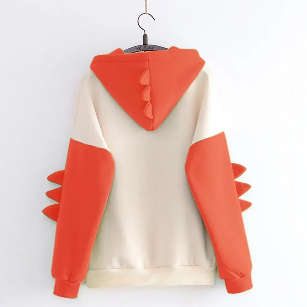 Back view of kawaii dinosaur sweatshirt with orange dinosaur spikes on hood and sleeves