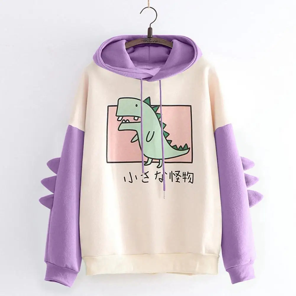 Kawaii dinosaur sweatshirt with purple sleeves and hood featuring a cute green dinosaur graphic