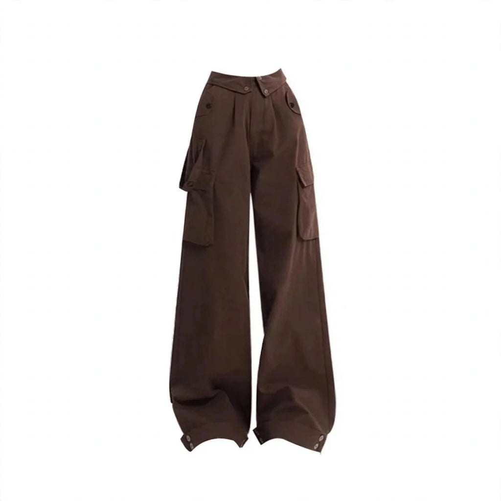 Black distressed sweatshirt layered over yellow plaid flannel with brown cargo pants, wide-leg cargo pockets