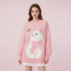 Pink fuzzy cat style oversized sweater featuring a white cat with a large pink bow and butterfly detail